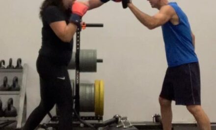 Punching and kicking at the Gym with Denise.  Shane Grantham fitness blog