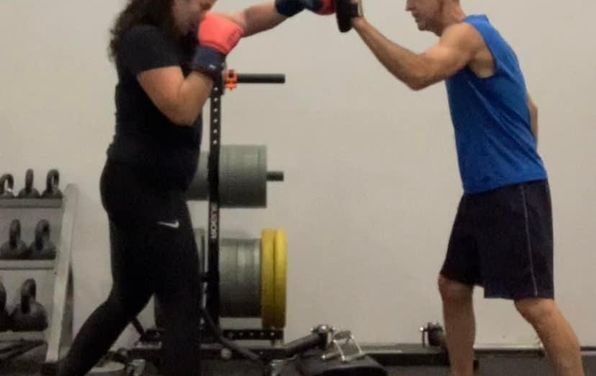 Punching and kicking at the Gym with Denise.  Shane Grantham fitness blog