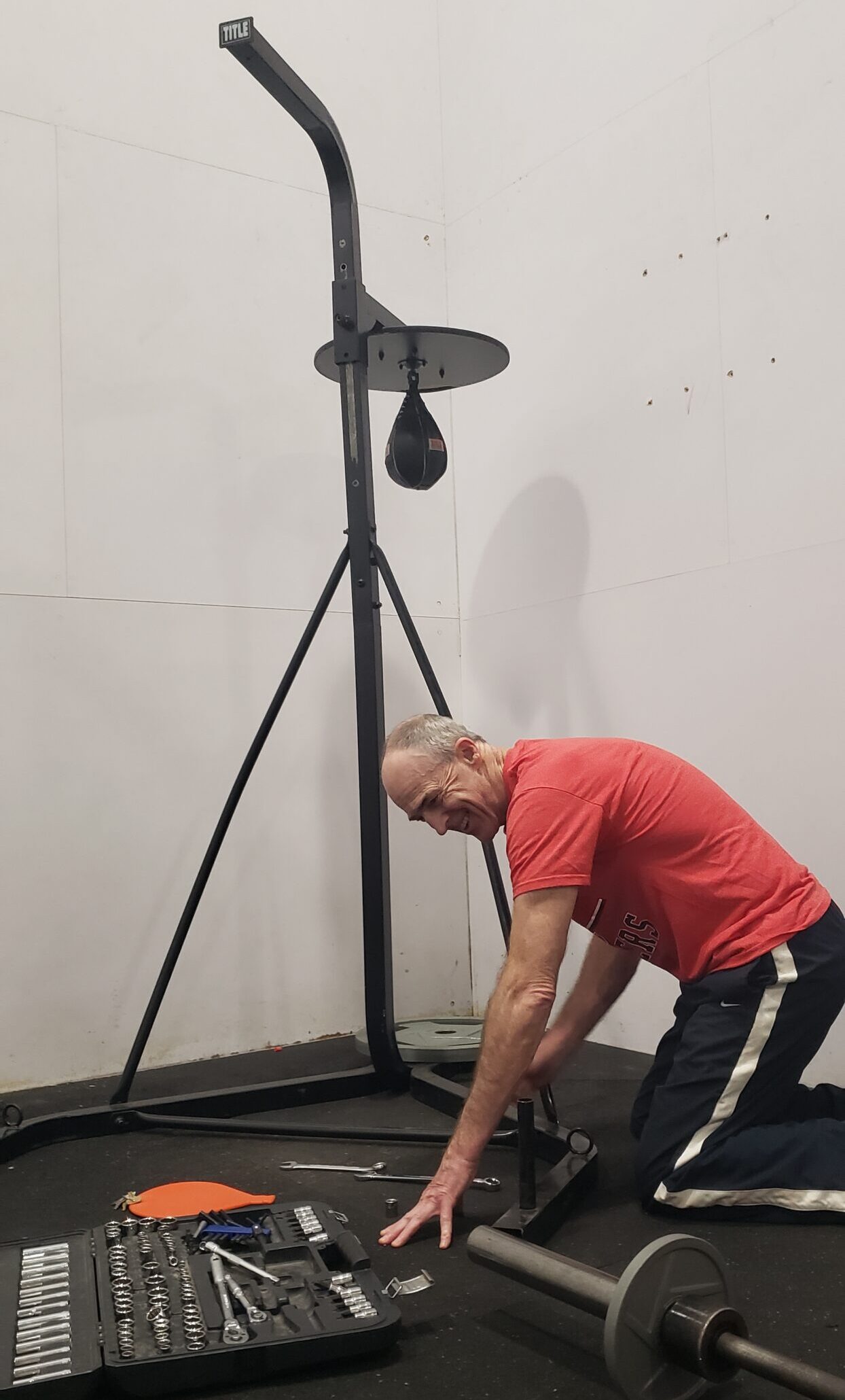 The heavybag/speedbag stand is gone.